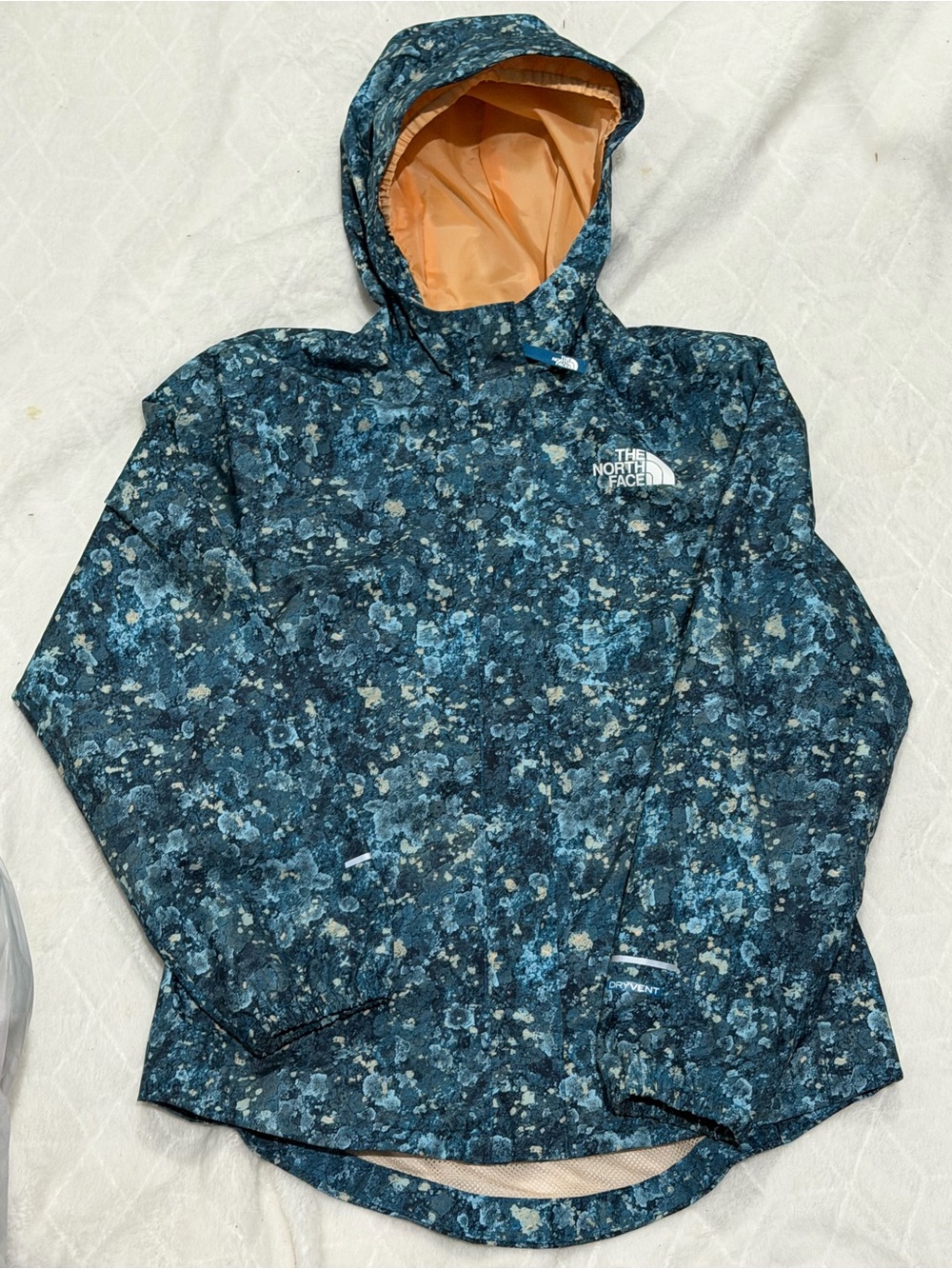 The North Face Blue Floral-Pattern Hooded Raincoat with Orange Lining